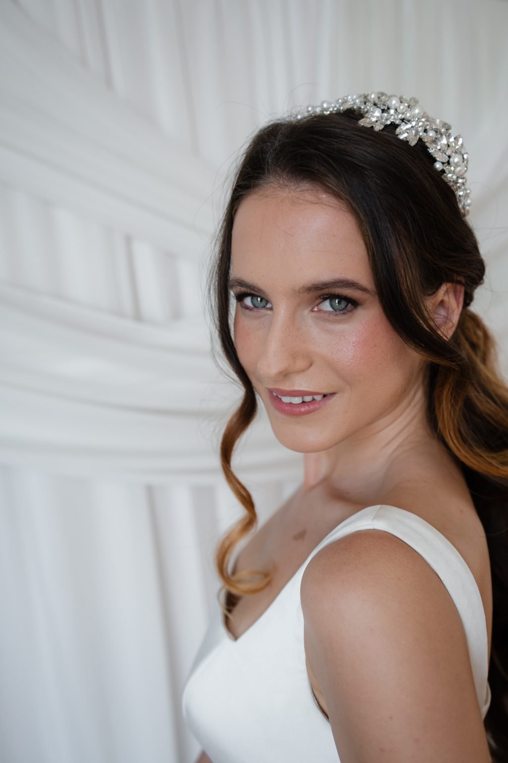 Rosebud bride with soft, glowing bridal makeup