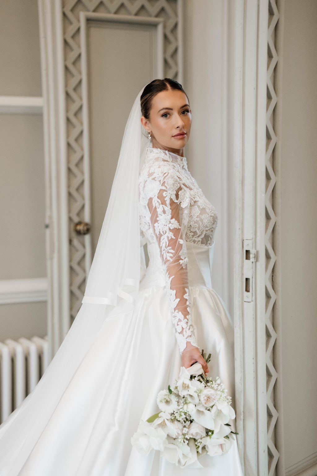 Bride in a lace veil on her wedding day